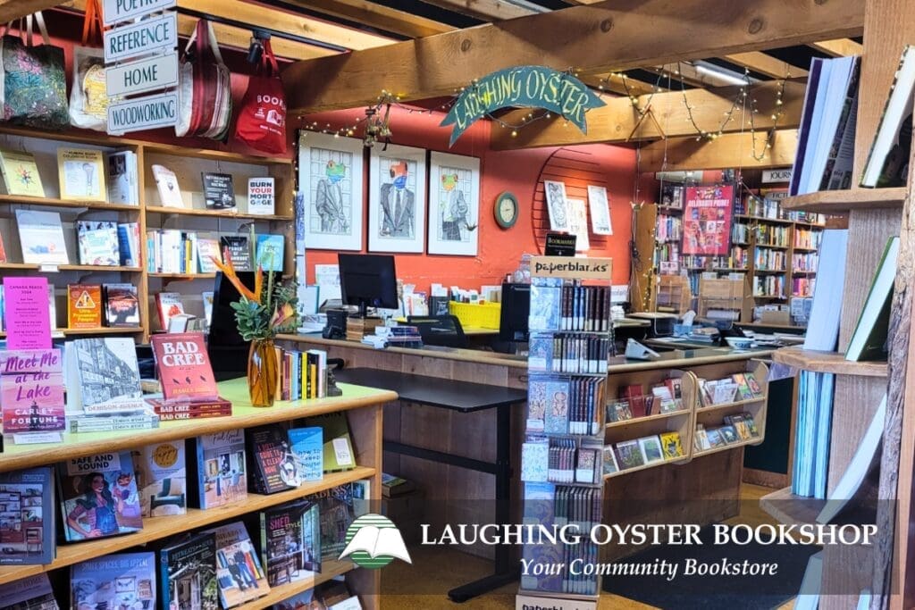Colorful interior of Courtenay’s Laughing Oyster Bookshop, with books and wooden shelves.