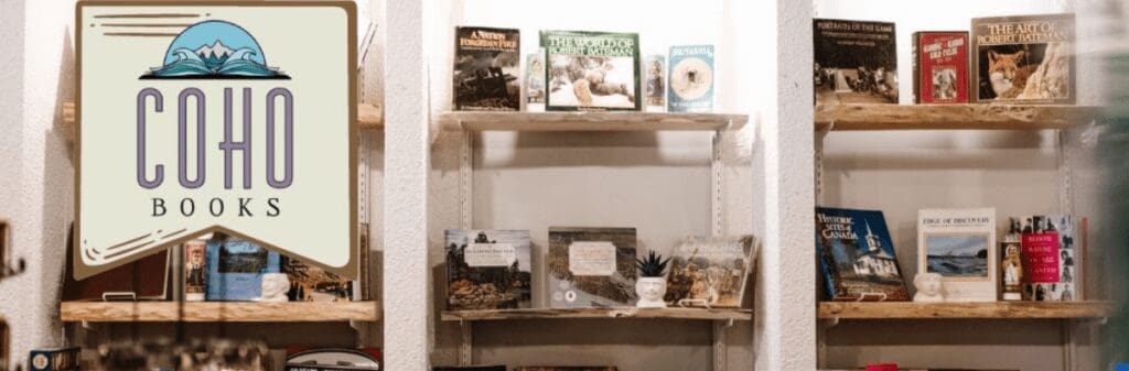 Bookshelves for curious readers at Coho Books, downtown books spot with a mountain logo.