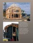 A wooden house frame under construction, with workers and sheathing being installed on the exterior.