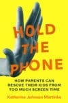 A hand holds the "Hold the Phone" product on a vibrant yellow background.