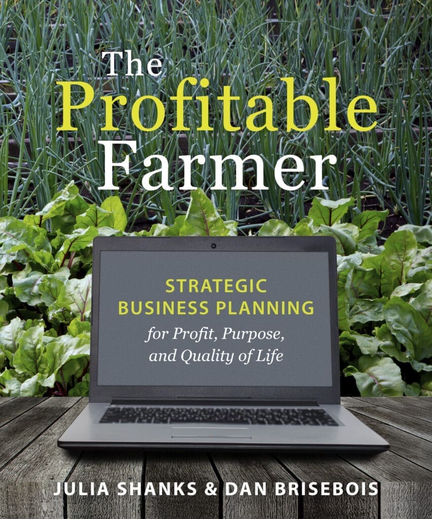 Laptop on table by greens, showing "The Profitable Farmer: Strategic Planning" on screen.