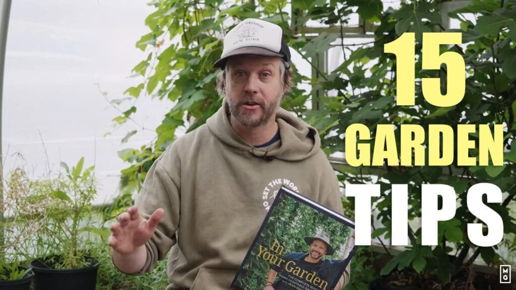 Man in a greenhouse holding a gardening book; text reads "15 Garden Tips In Your Garden.